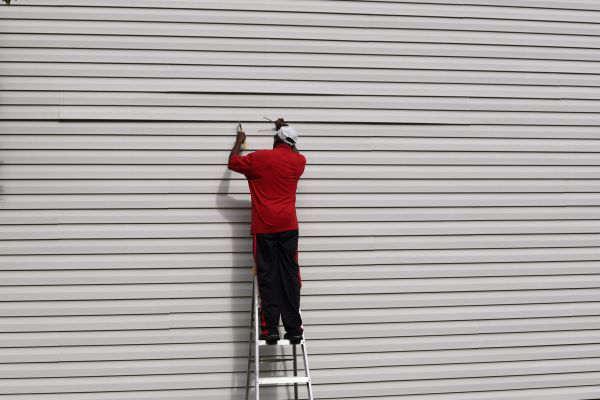 Loose Siding Repair in Brick