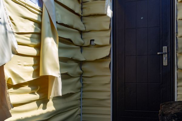 Melted Siding Replacement in Brick