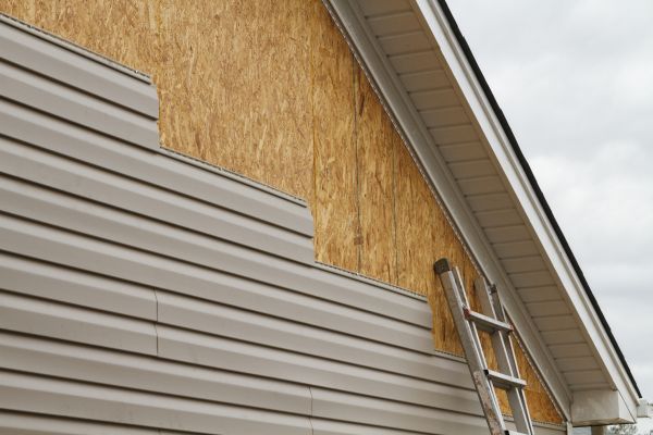 Loose Siding Replacement in Brick