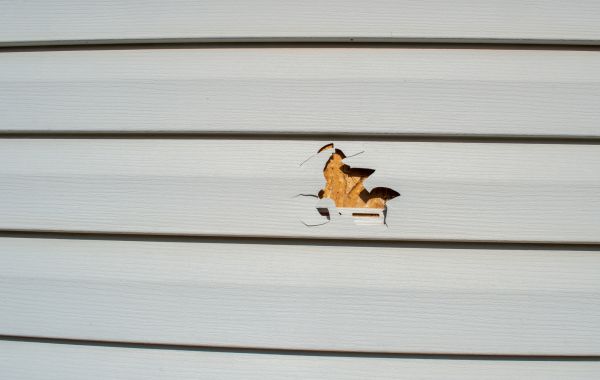 Siding Hole Patching in Brick