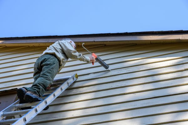 Vinyl Siding Caulk Repair in Brick