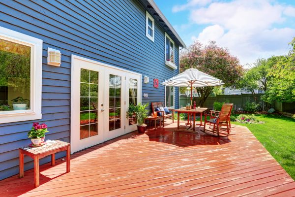 Blue Siding Installation in Brick