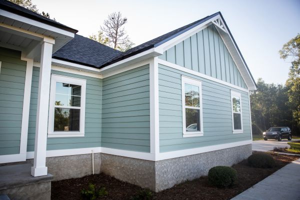 Board Siding Repair in Brick