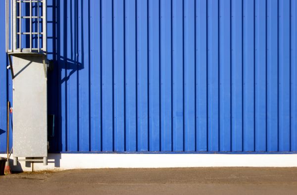 Ribbed Metal Siding Repair in Brick
