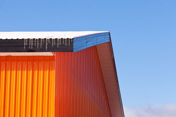 Sheet Metal Siding Replacement in Brick