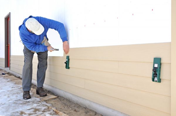 Cement Siding Replacement in Brick