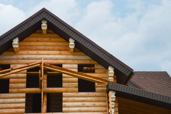 Log Home Siding Installation in Brick